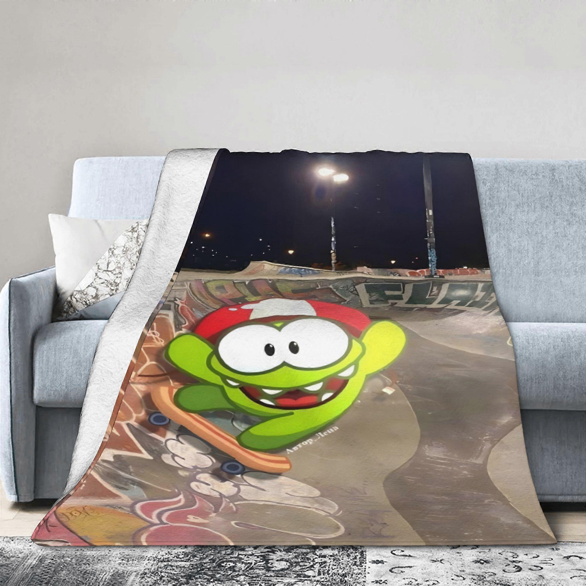 Este cobertor de flanela estilo Om é macio e quentinho.
