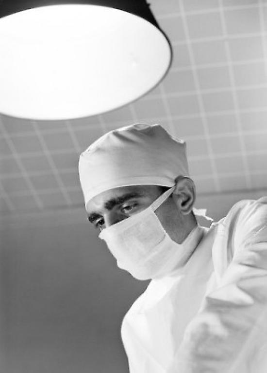 Surgeon in operating room Poster