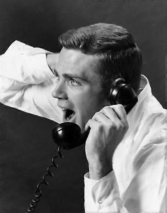 Close-up Of A Young Man Shouting On The Telephone Poster