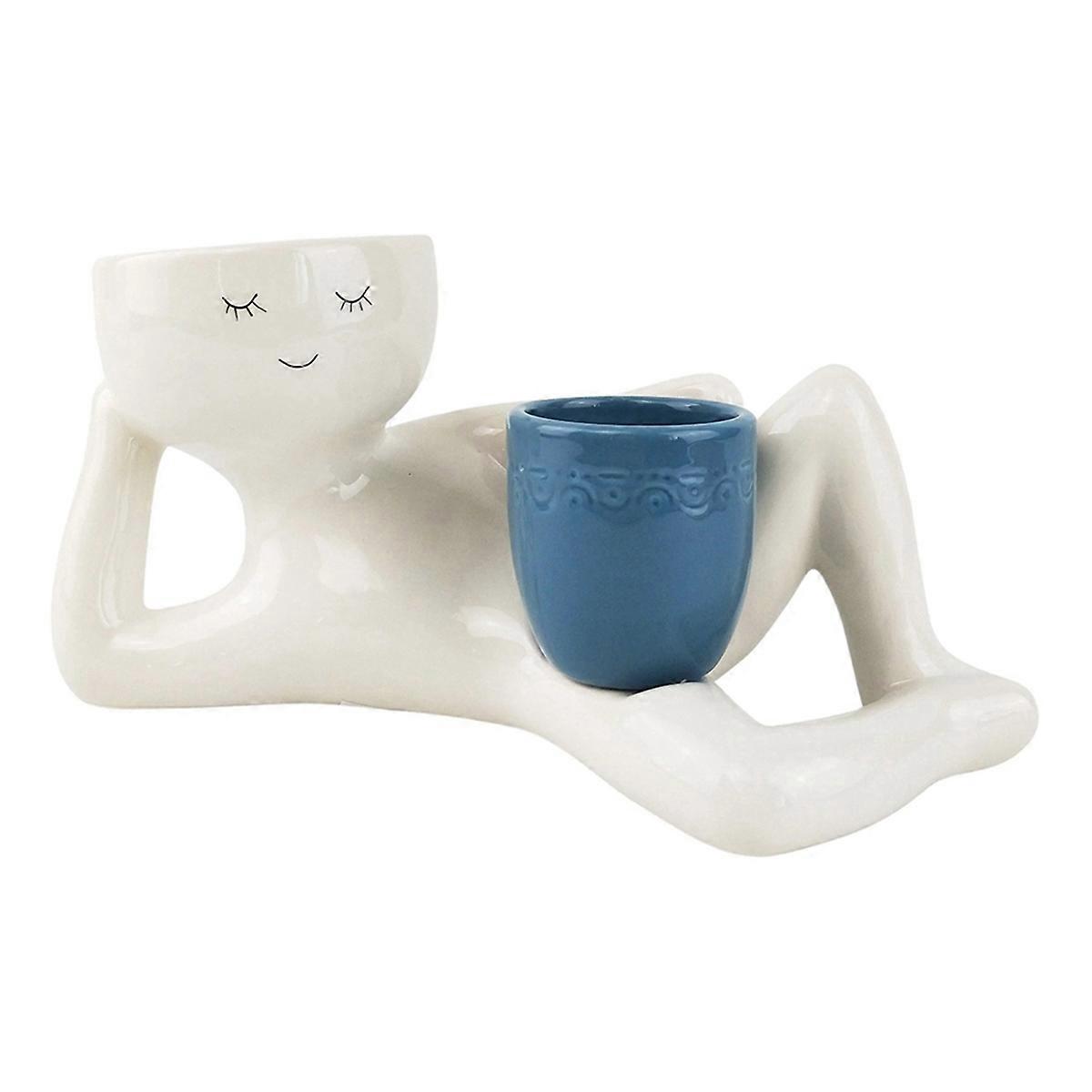 Relaxing Person Holding Pot Planter with Drainage Hole Blue