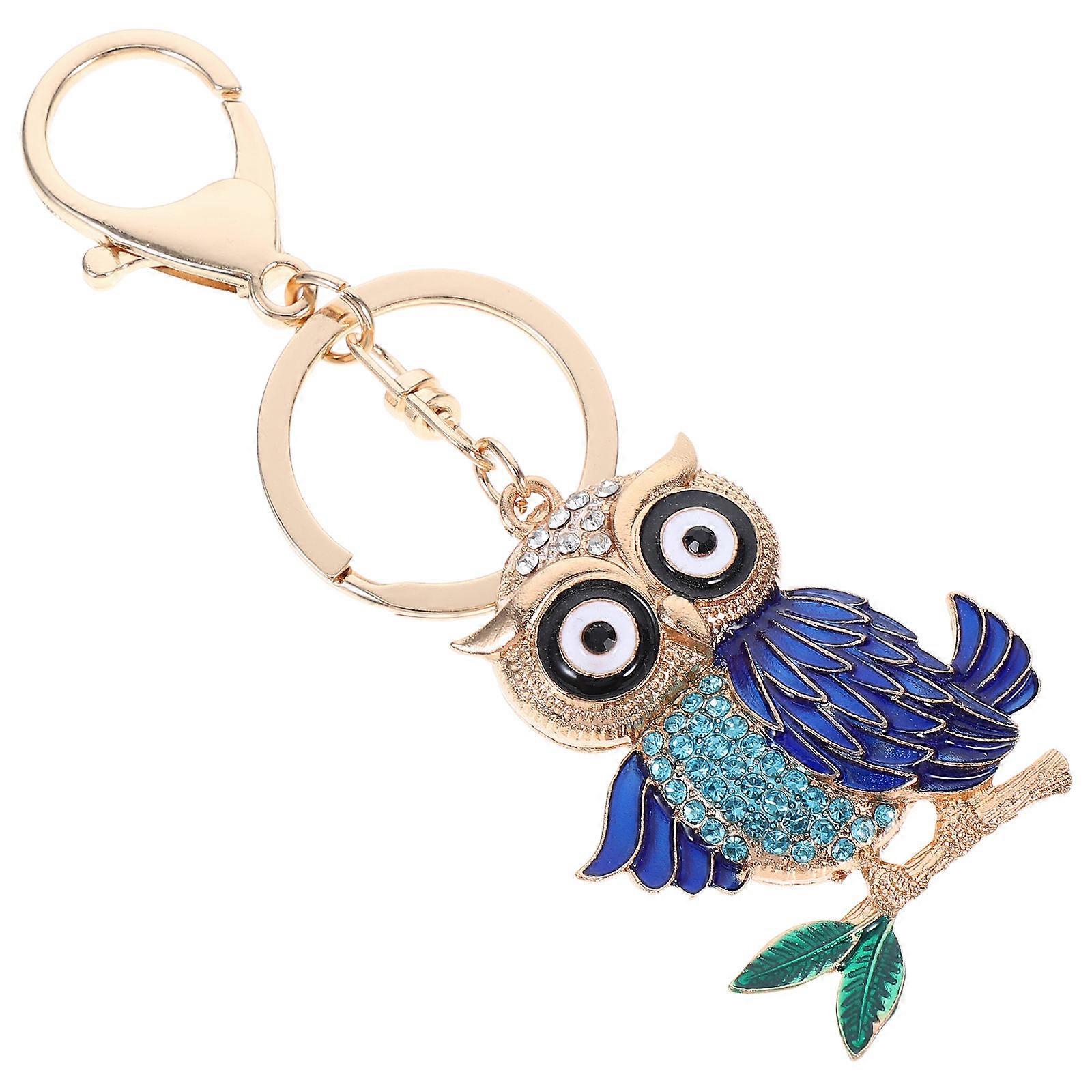 Here's a refined and engaging product description for your **Sparkling Rhinestone Owl Keychain Pendant**:
✨ **Sparkling Rhinestone Owl Keychain