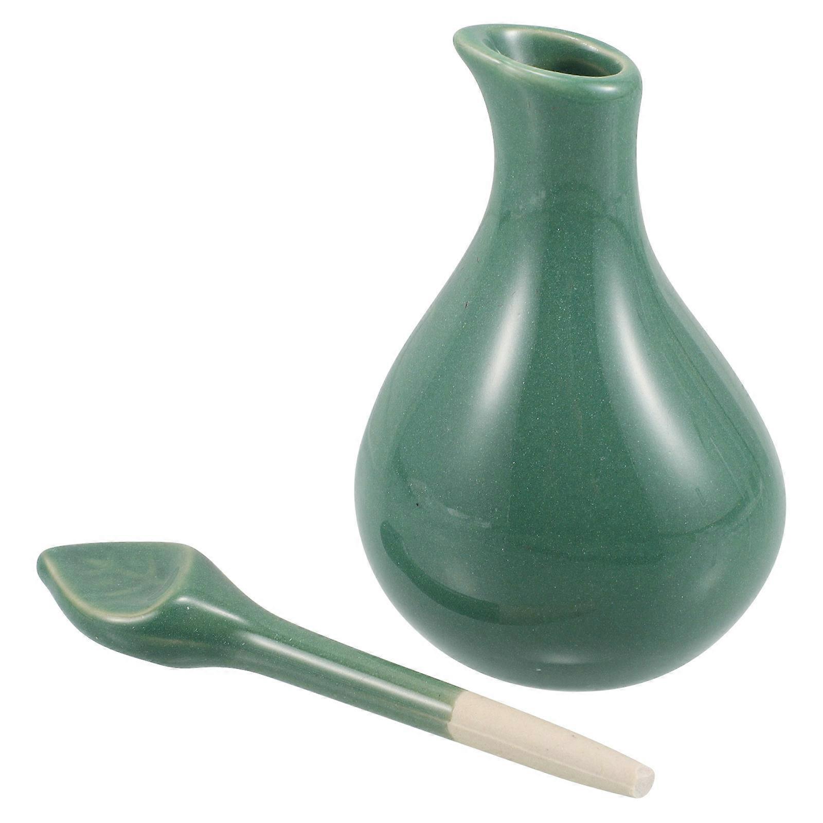a polished and professional product description based on the details you provided:
**Elegant Decorative Ceramic Essential Oil Bottle with