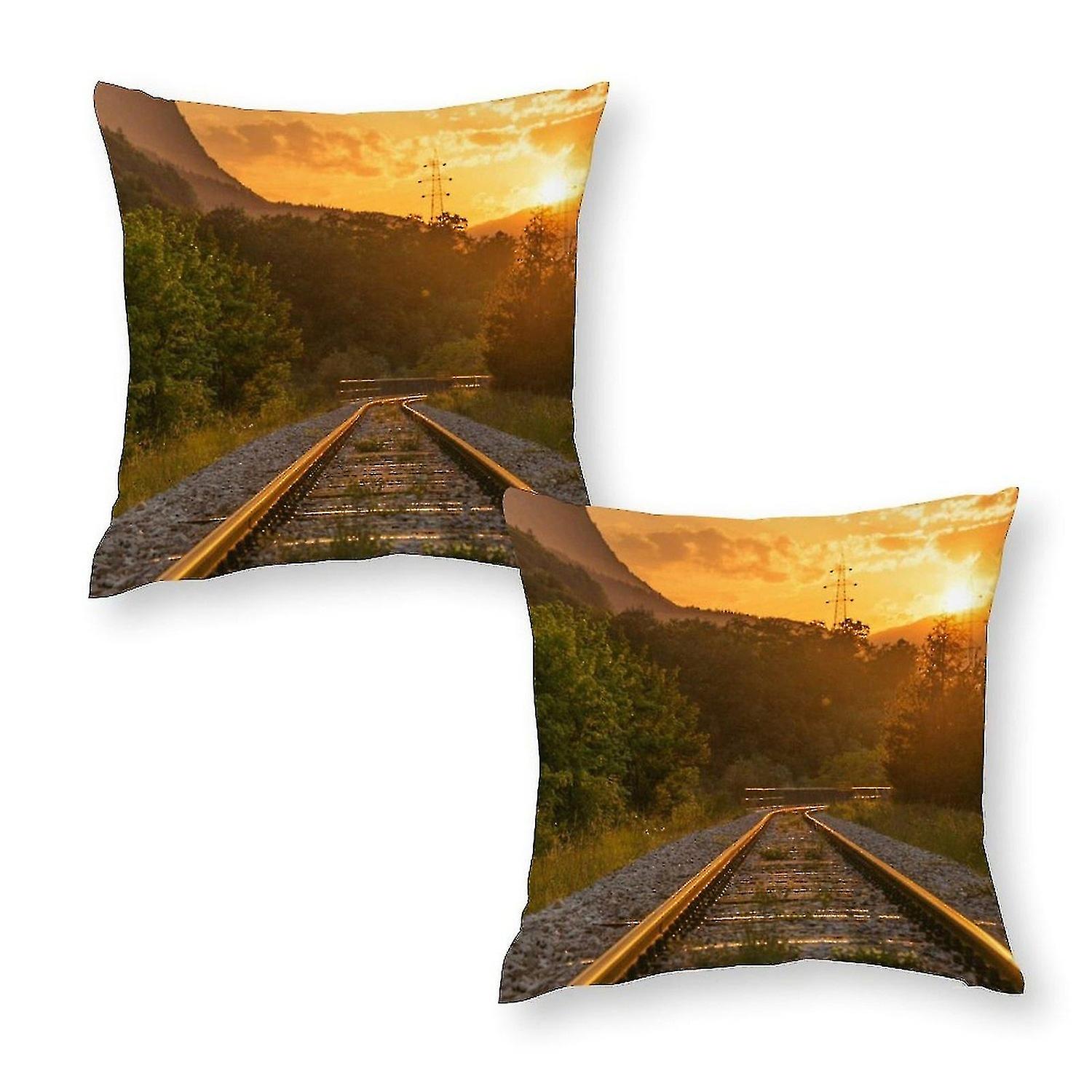 Tree print pillowcase near train railway
