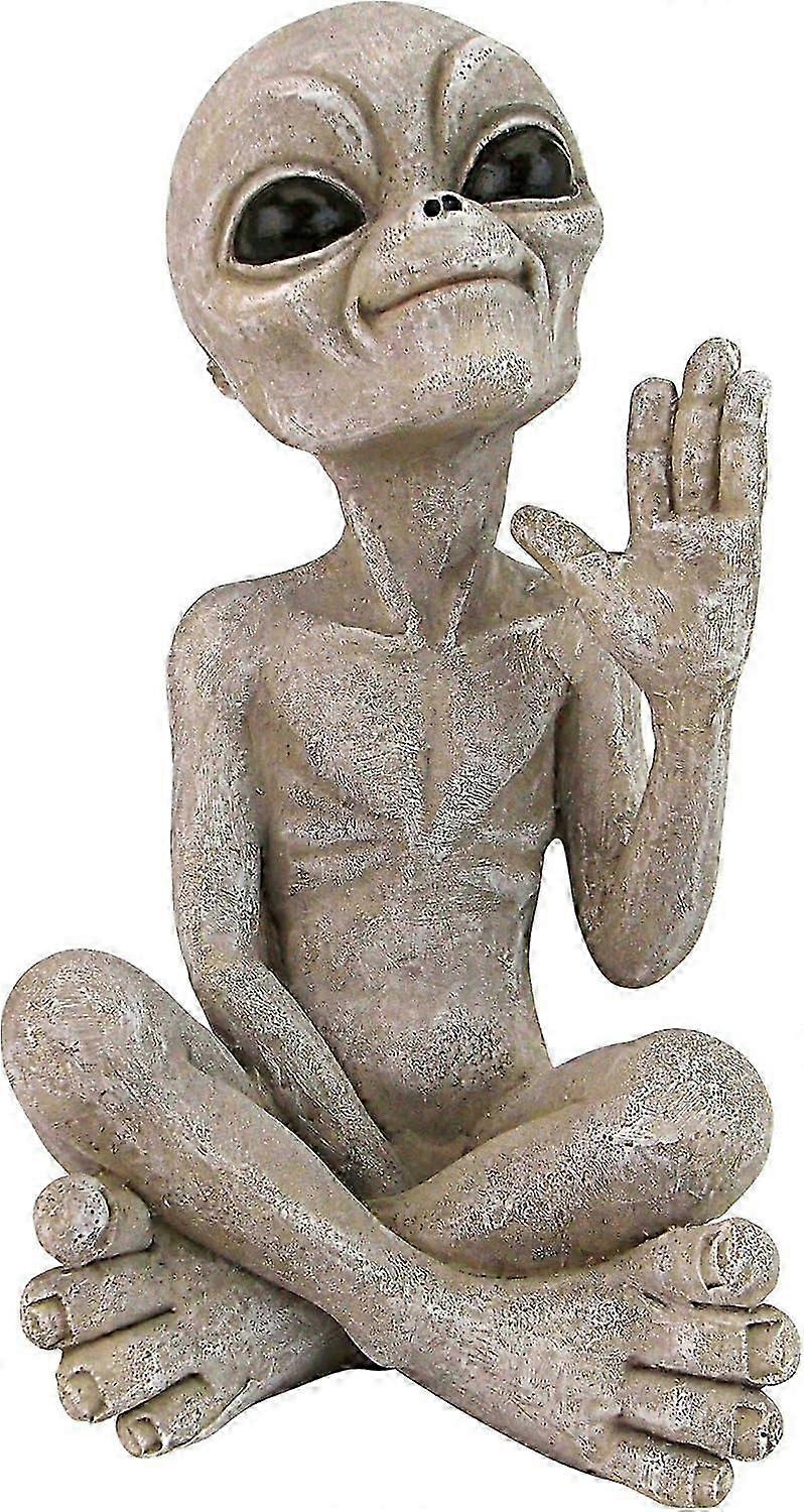 UFO alien statue, small sitting, sandstone