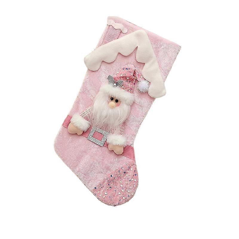 Pink sequined Christmas stockings, made of cloth with multiple patterns, add a festive atmosphere