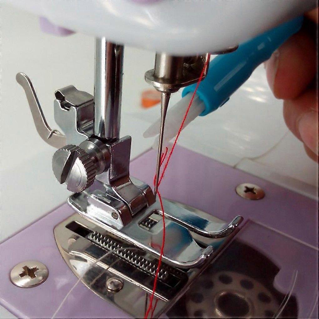 Needle threader, needle replacement, sewing tools, threading, beautiful brown.
