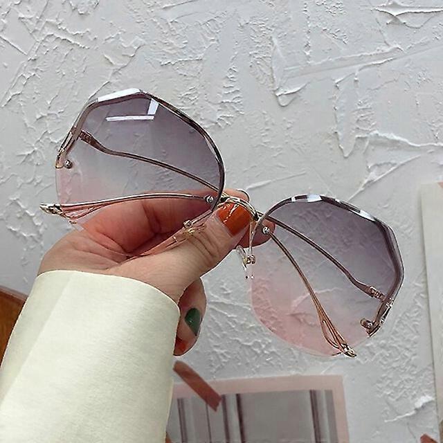 Epäsäännölliset pyöreät aurinkolasit Nainen Brändi Suunnittelija Gradient Muoti Aurinkolasit Nainen Reunaton metalli Kaarevat temppelit Oculos De Sol