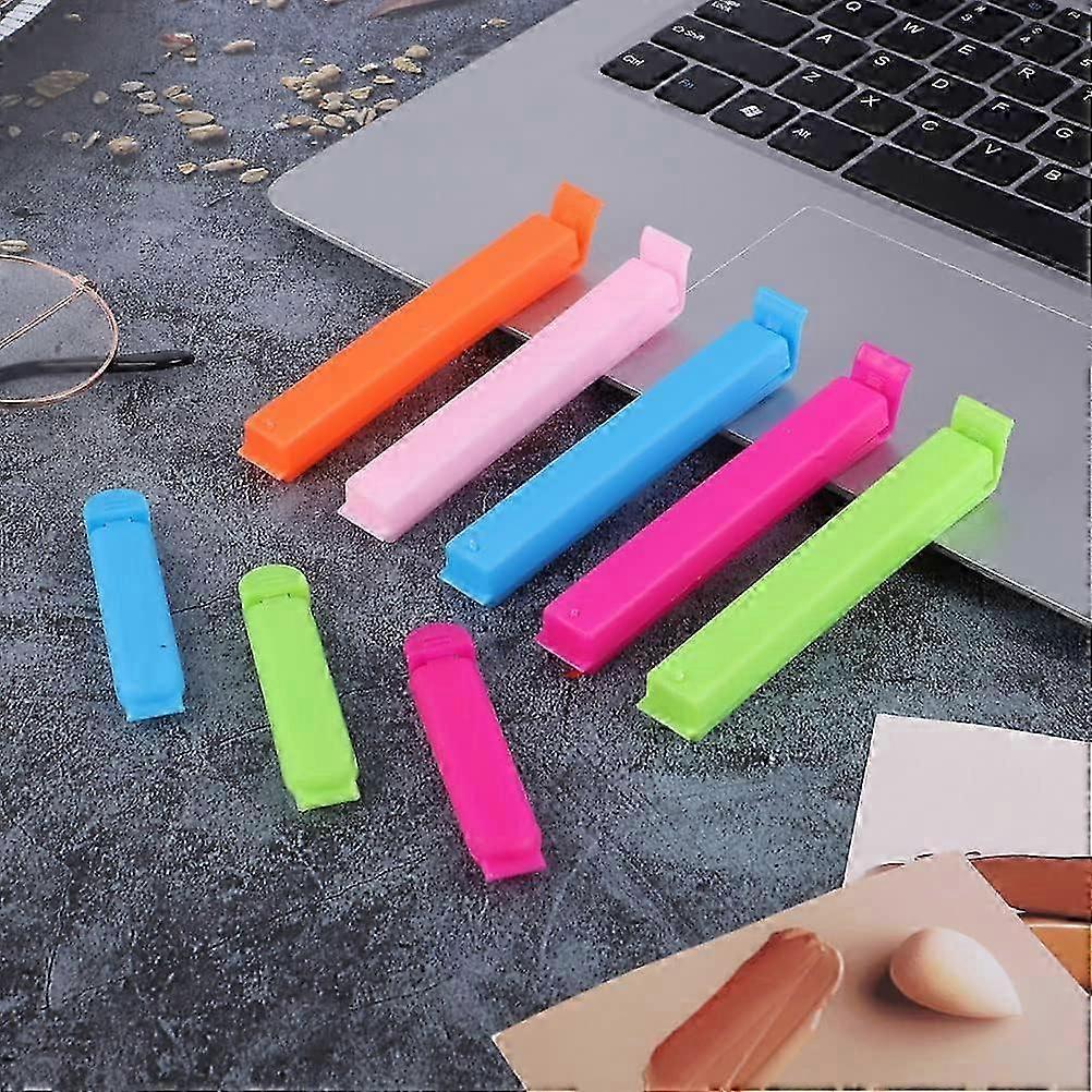 26-27 8 voedselsluitclips, roze.