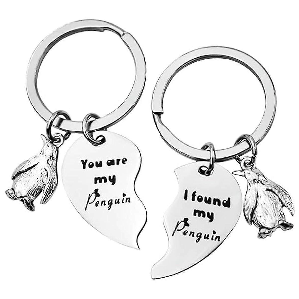 1 pair of penguin keychains-silver