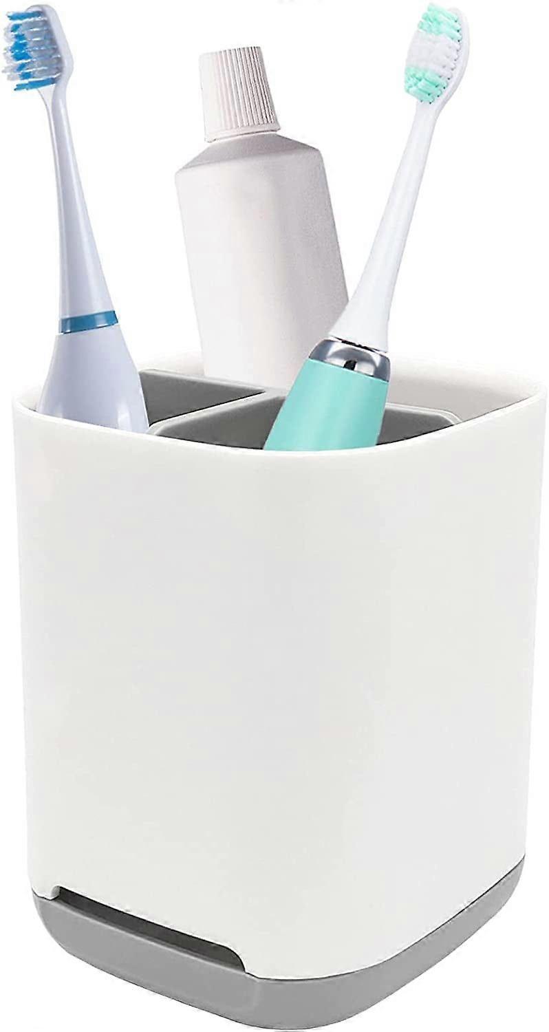 Toothbrush holder for regular toothbrushes, rotating toothbrushes and toothpaste