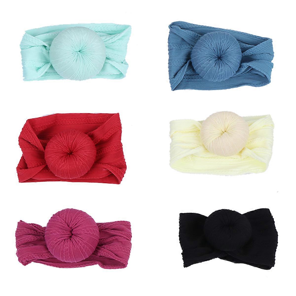 It looks like you're describing a product listing for **knotted head wraps** or **donut ball headbands** designed for **newborns**. These are popular