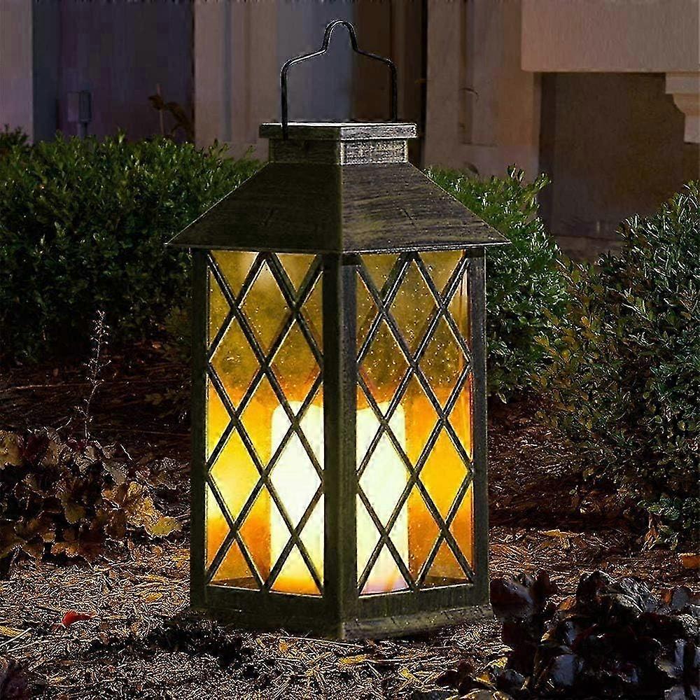 屋外ソーラーガーデンランタンハンギングランタンは、太陽エネルギーランタン照明装飾と輝く炎のないキャンドルランタンを導いた