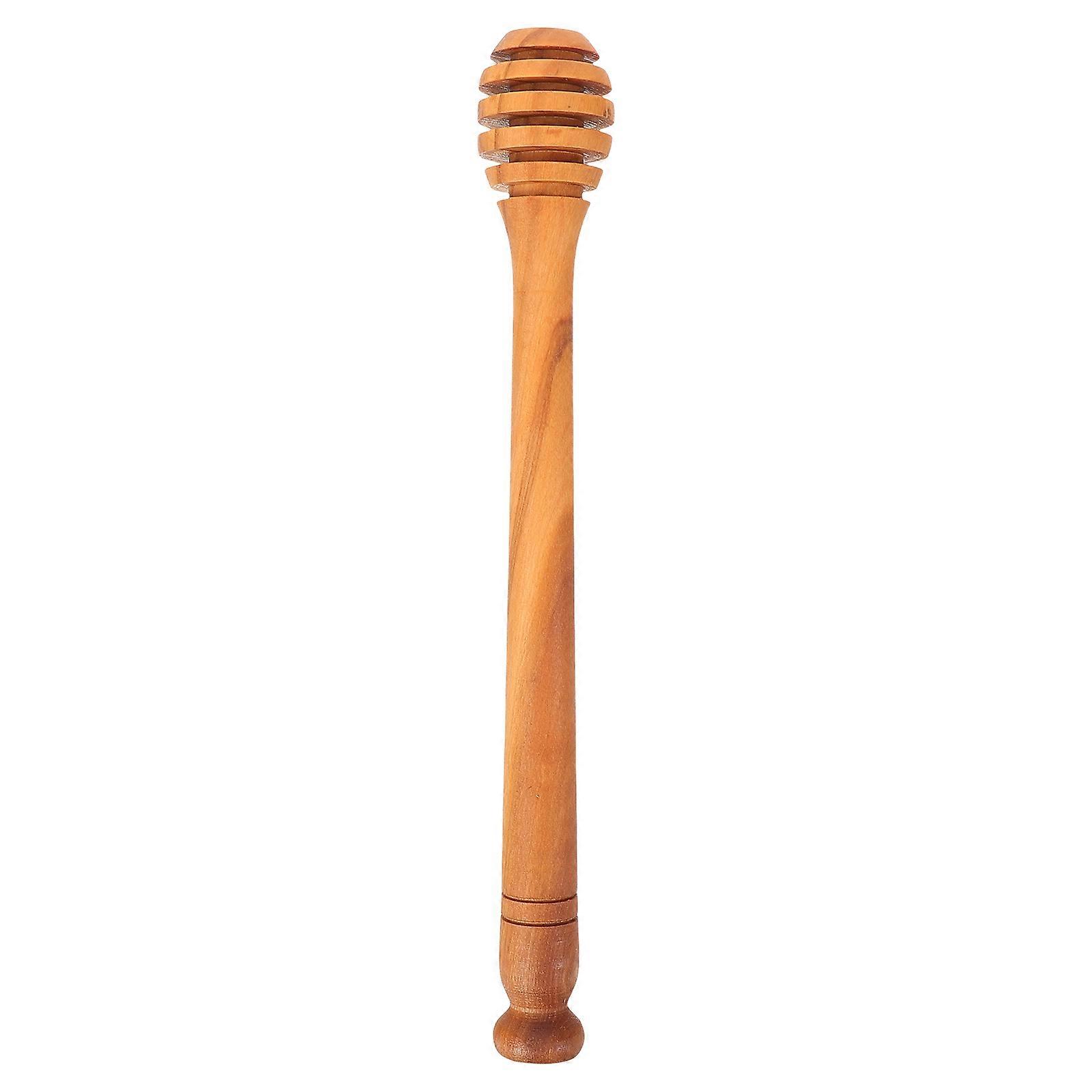 The **Wooden Honey Dipper (Large Olive Wood Honey )** is a practical and tool designed for dispensing viscous liquids like honey, jam, syrup, and