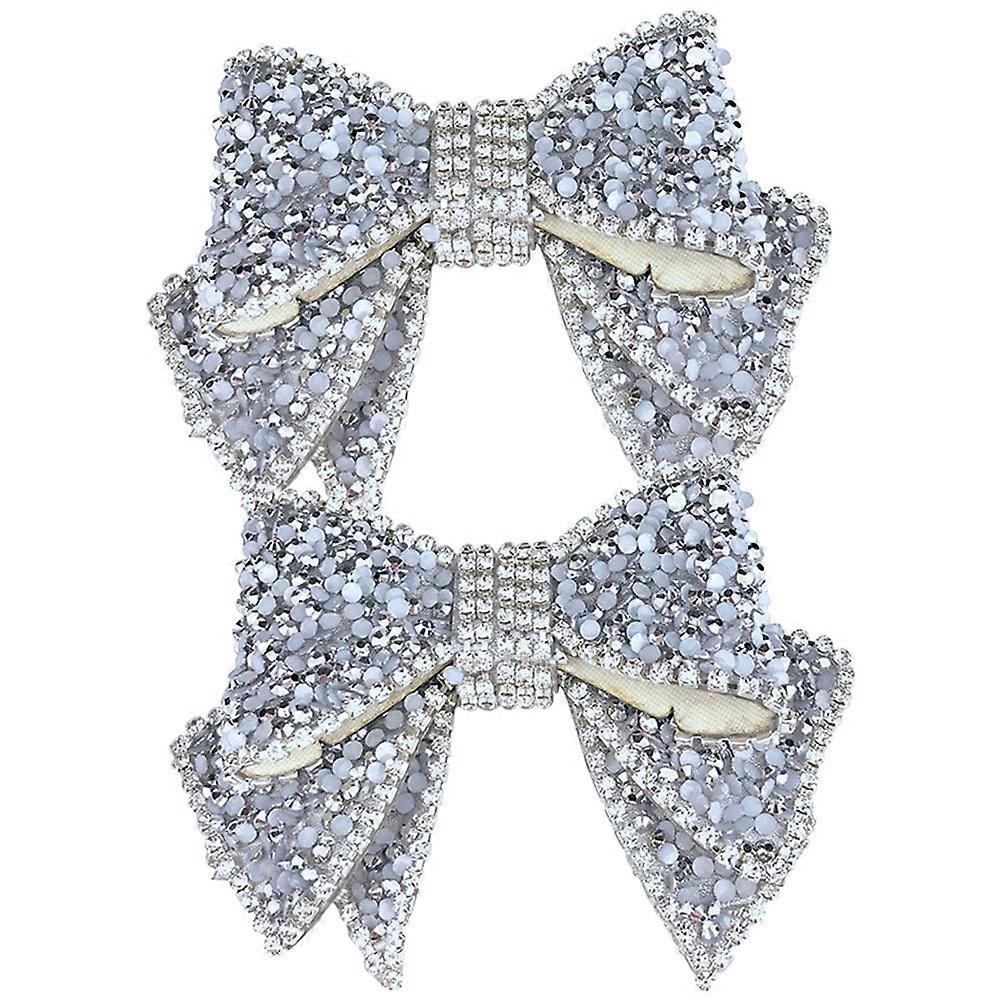 a refined and engaging product description based on your input:

 

**2pcs Bowknot Shoe Charms with Rhinestones – Elegant DIY Shoe Ornaments for