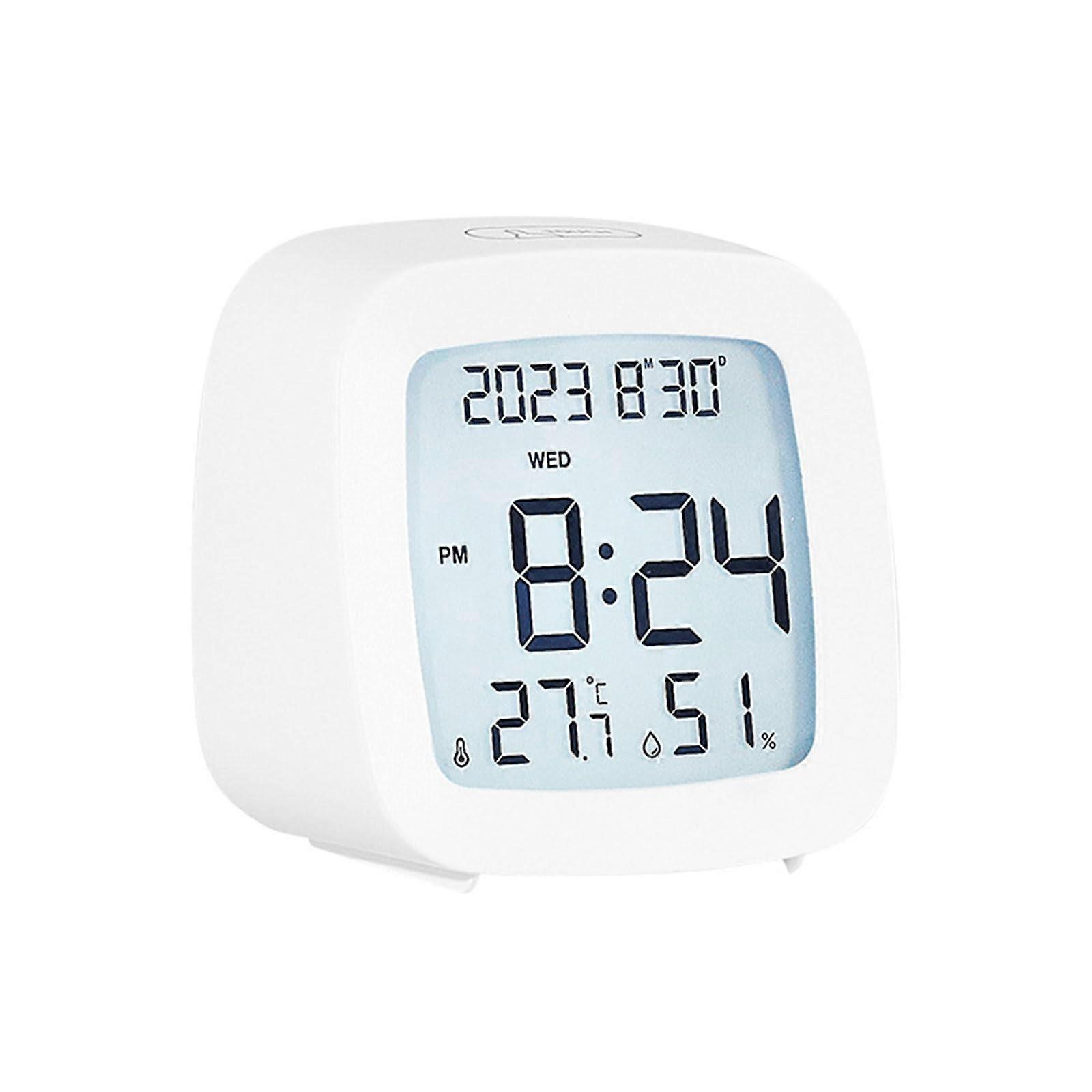 Clock with temperature and humidity display, practical for travel and home use. Ref: 2810