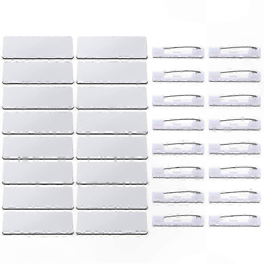 16 badges personnalisables par sublimation, avec système de fixation à l'arrière, adaptés pour les bureaux, les écoles et les événements. Panneaux en métal blanc de haute densité, dimensions : 7,6 x 3,8 cm.