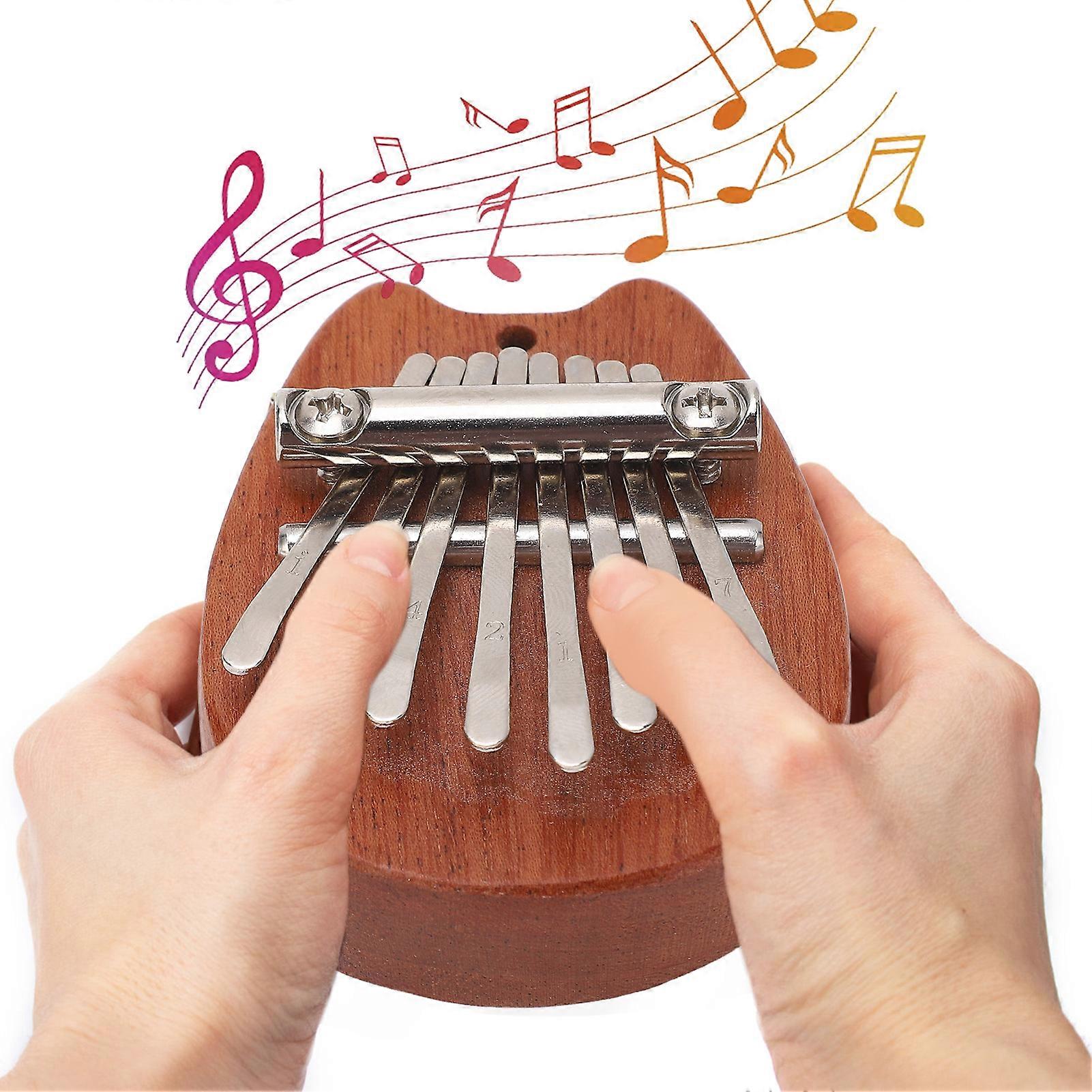 ミニカリンバ8キークリアで心地よいサウンドハンギングロープ付きポータブル親指ピアノXA67キャットヘッド