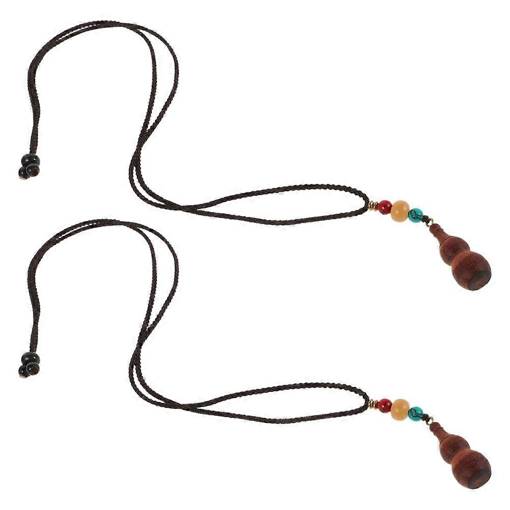 Here's a polished product description based on your input:

 

**Handmade Sandalwood Long Chain Jewelry for Women – Ethnic Boho Pendant with Unique
