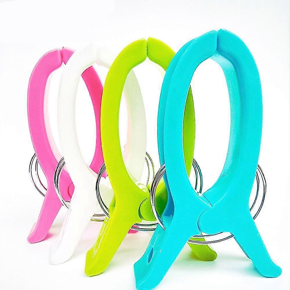 Förpackning med 8 Lar din strandhandduk pinnar clips