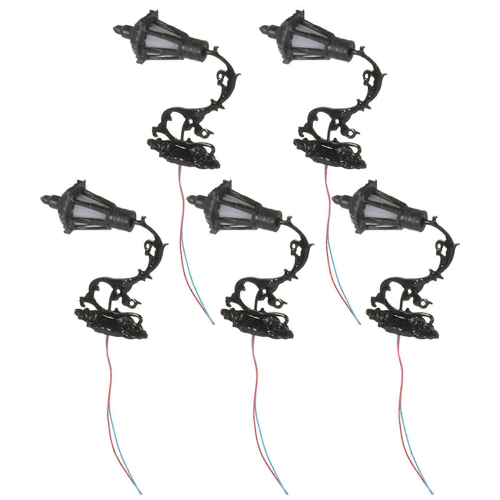 Here's a refined and appealing product description based on your query:
**5PCS Miniature LED Wall Lamps – Durable Tiny Lights for DIY Table Decor
