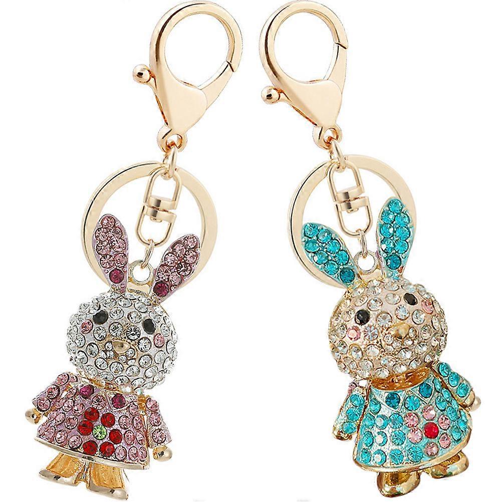 Here's a polished and professional product description based on your input:
**2pcs Cute Bunny Keychain Pendant – Adorable Rhinestone Rabbit