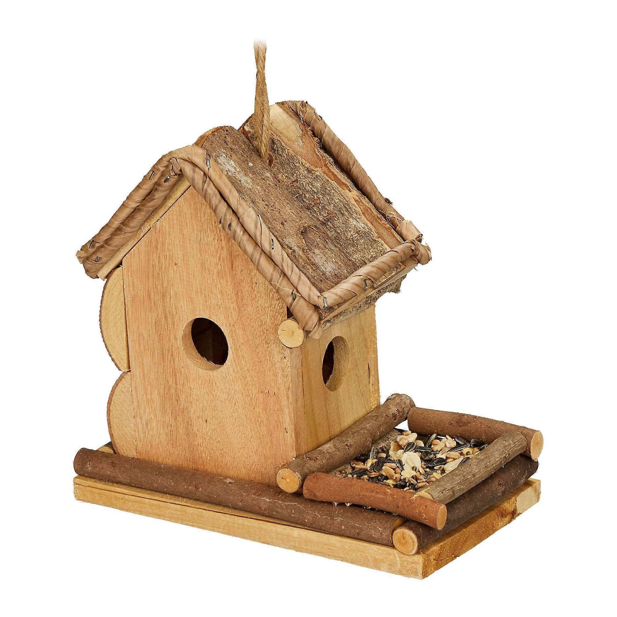 Decorative birdhouse with feeding station