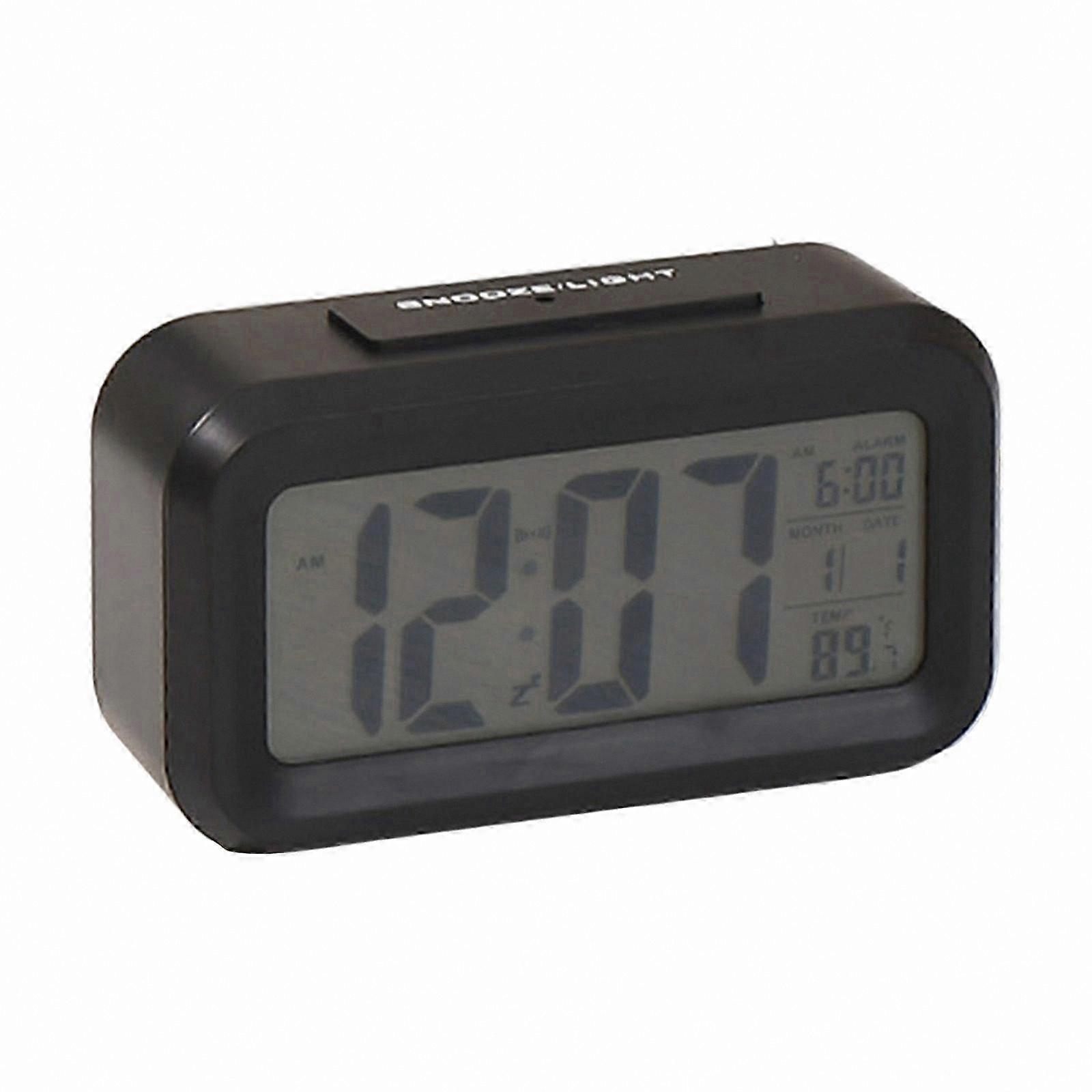 White Plastic Alarm Clock with Calendar, Temperature Display, Snooze, and Auto Nightlight Function Battery Powered