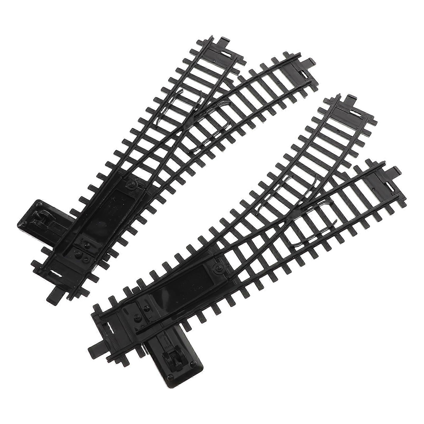 2 pieces of model railway tracks. Uniquely designed and easytoassemble plastic track parts for children's playtime and family interaction.
