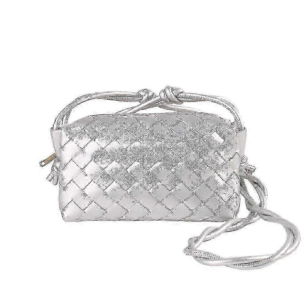 Bolsa para câmera com detalhes em couro trançado e alça transversal clássica com zíper.