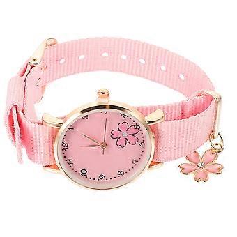 Polswatch met bloemenprint voor meisjes, in roze canvas met een ronde vorm. Ideaal als cadeau. 1 set.