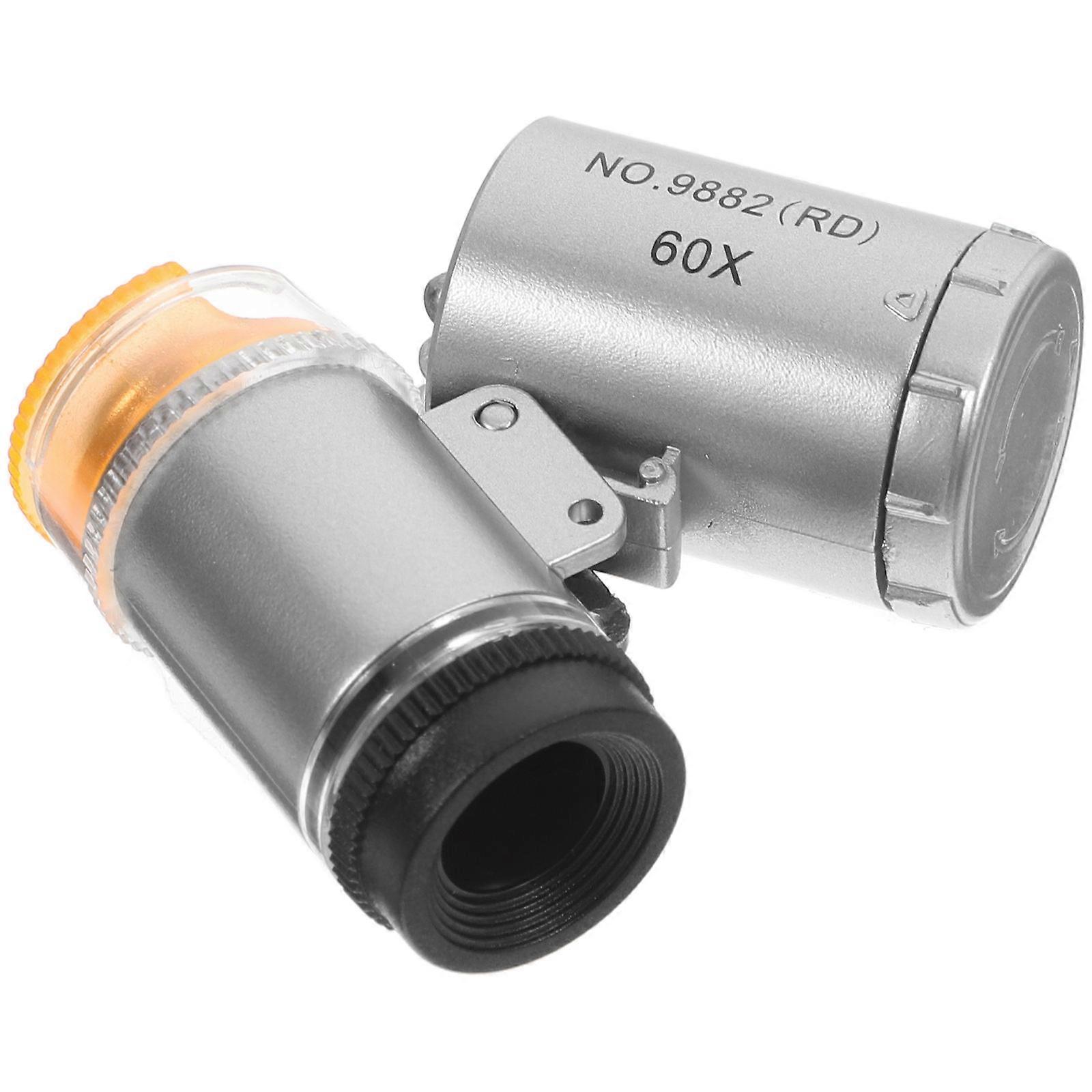 It looks like you're listing keywords or a product title for a **handheld magnifier microscope**, possibly for inspecting coins, makeup, or small