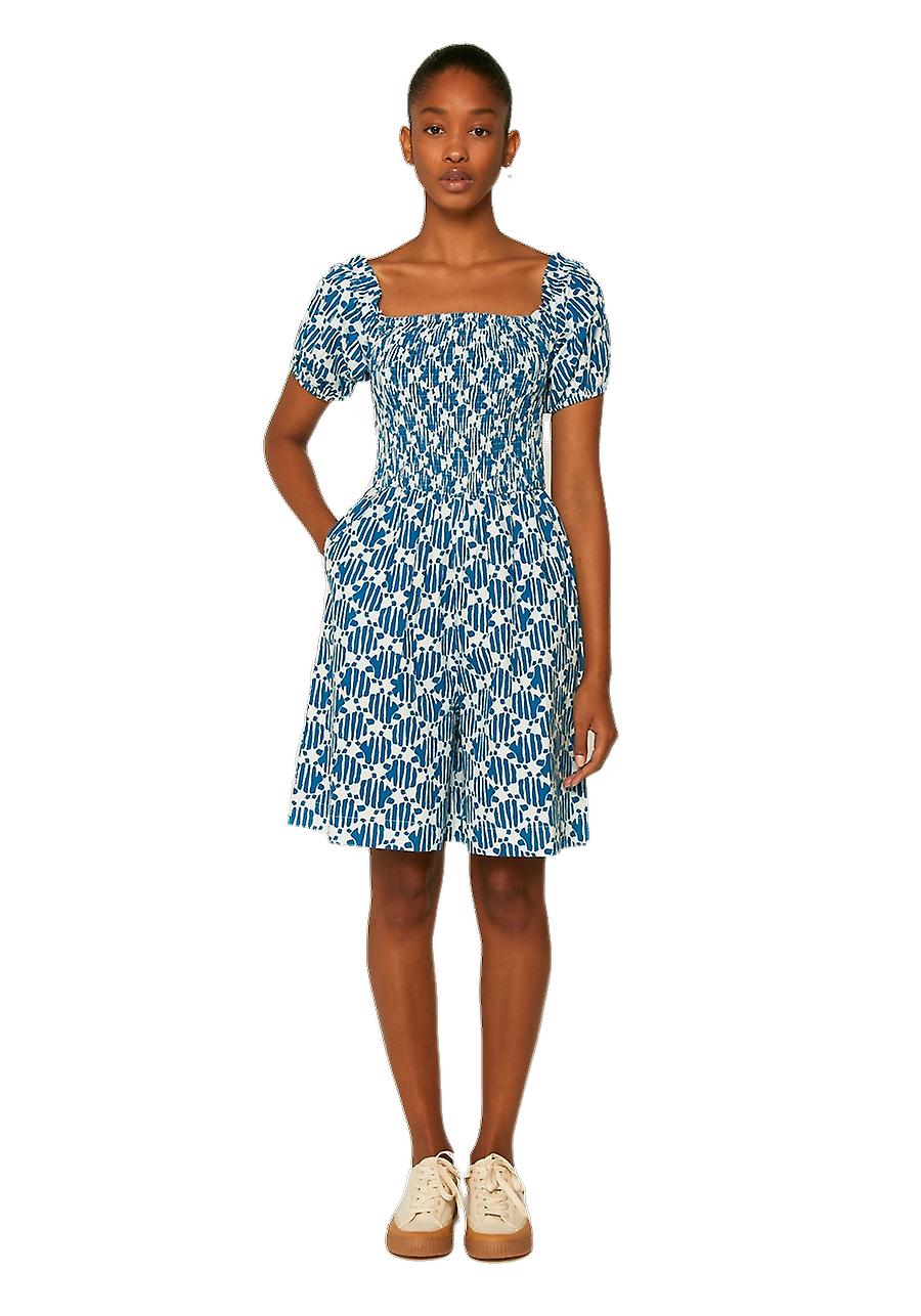 Turtle print smocked playsuit by Compania Fantastica
