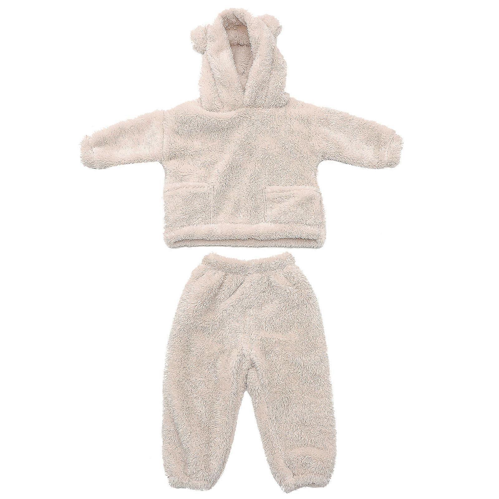 Here's a refined and engaging product description based on your input:
**Cozy Coral Fleece Pajamas for Boys – Warm Winter Loungewear**
Keep your