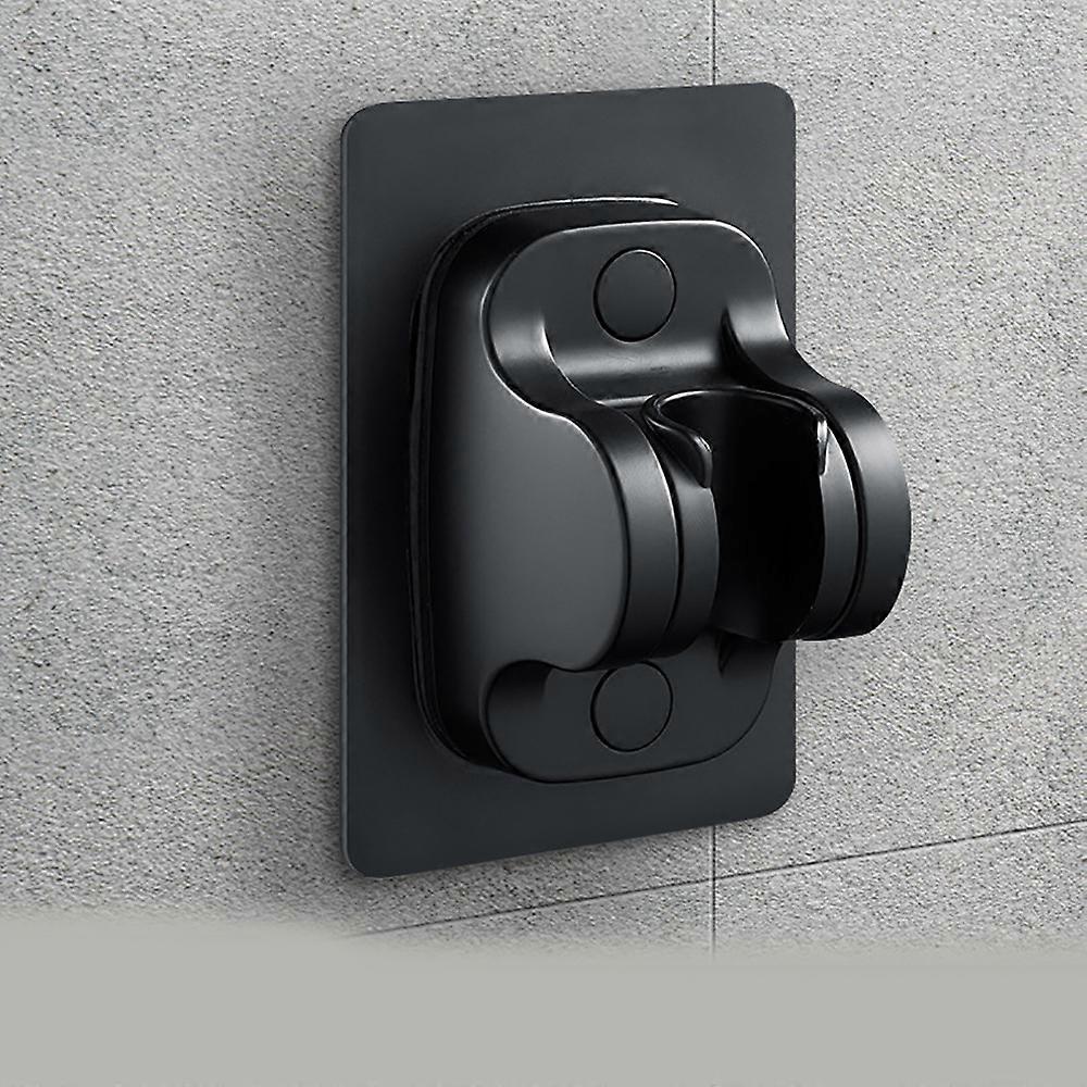 Ei poraavaa itseliimautuvaa mustaa seinälle asennettavaa suihkupidikettä, kädessä pidettävää suihkupään pidikettä;