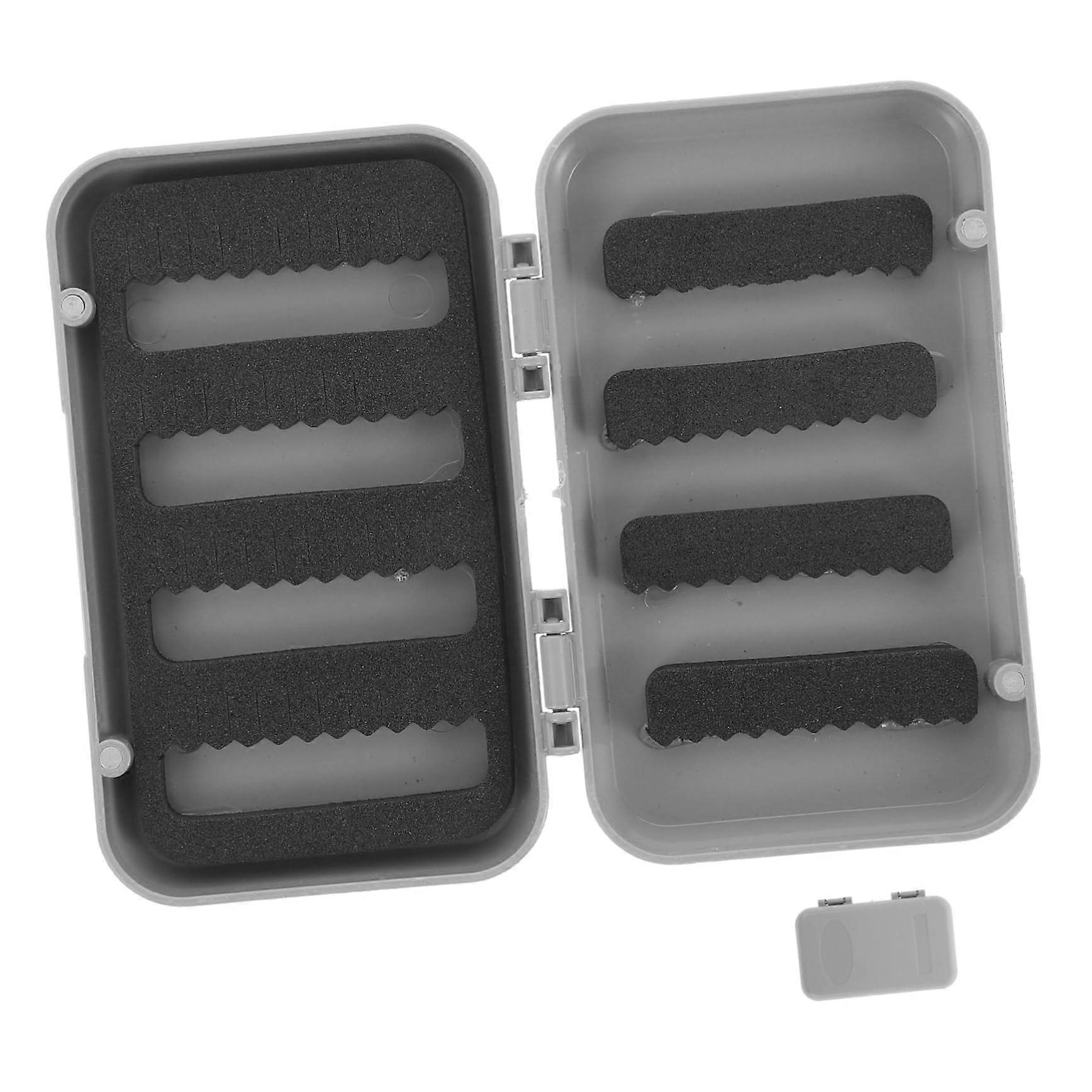 Small plastic storage solution for fishing equipment design with multiple compartments for hooks and bait for anglers