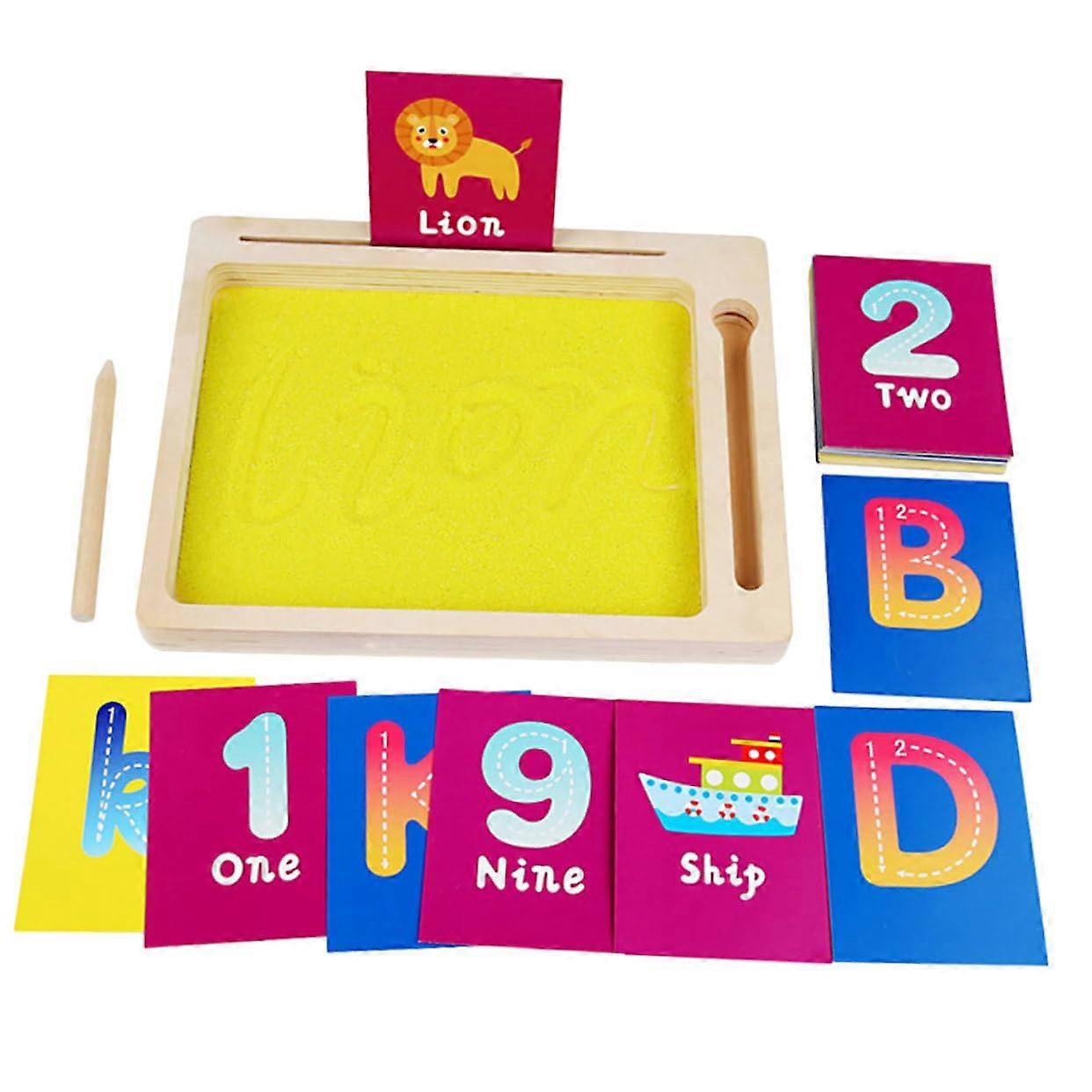 Creative sand painting young girl with educational toy words numbers and letters