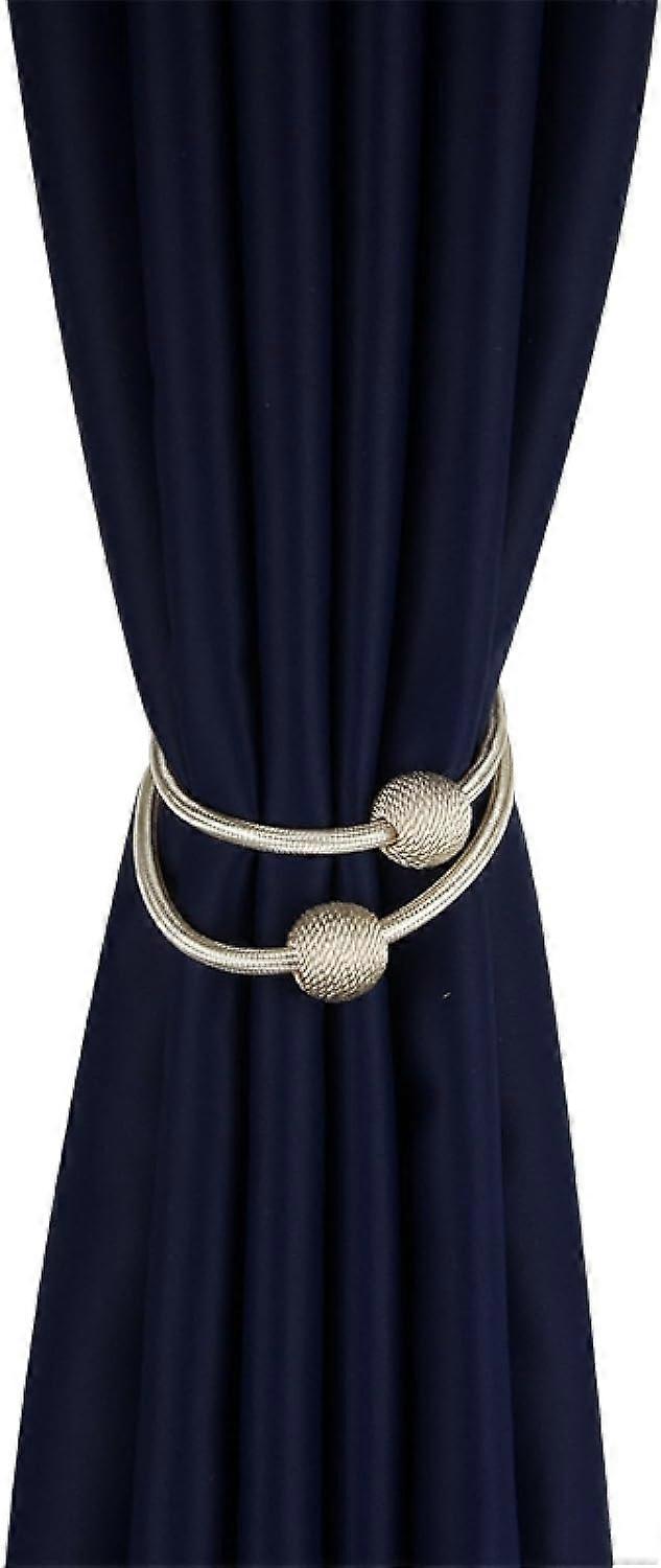 Two-piece magnetic curtain tie