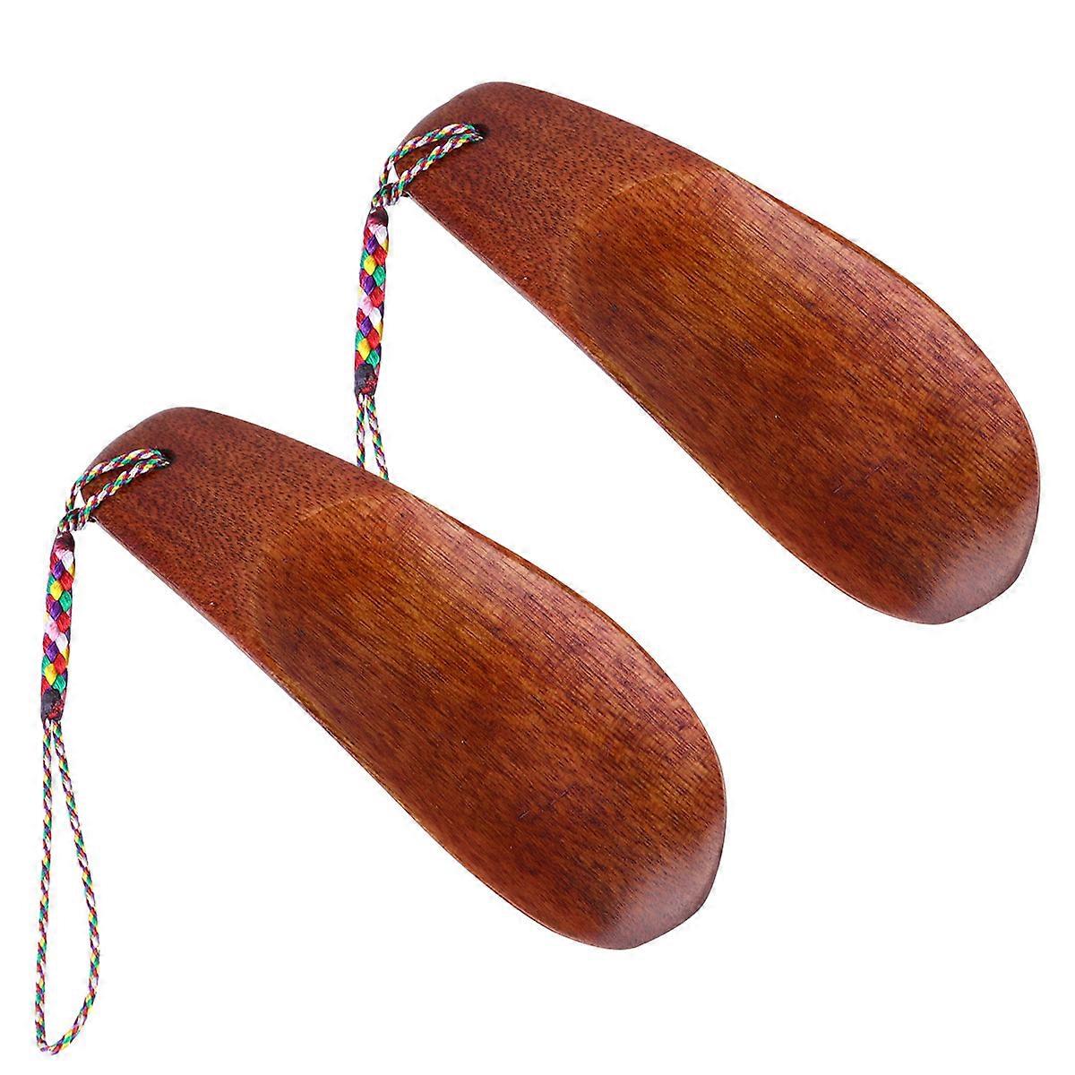 Compact Shoe Horns for Simplified Shoe Putting On, Robust and Lightweight Construction
