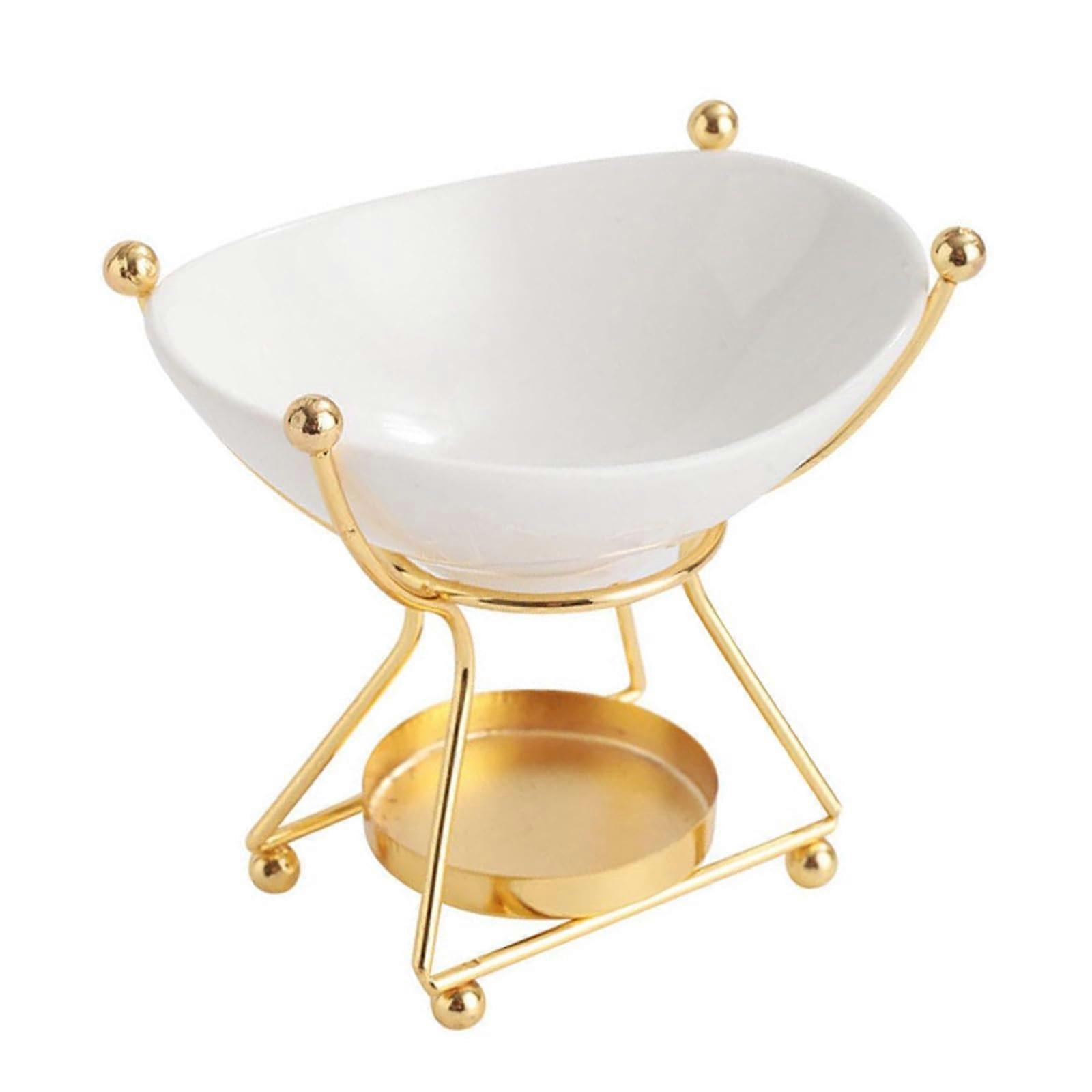 Elegant ceramic aroma lamp for essential oils, tea light holder, stand, aromatherapy, diffuser, warmer for a relaxing home ambiance in gold.