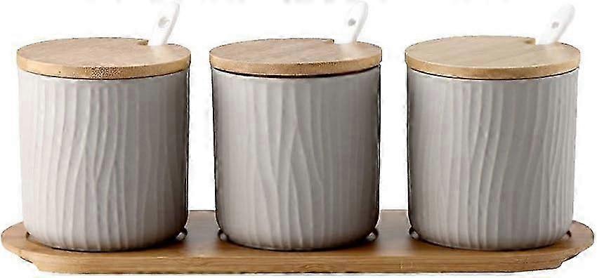 Gray ceramic condiment jar set with lids and spoons, accompanied by a wooden serving tray suitable for kitchen use, measures 9.5 * 28.5cm.