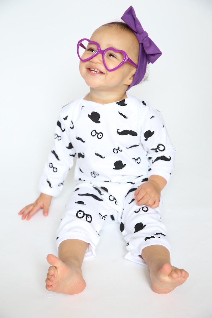 Moustache Pattern Baby Grow In Black & White