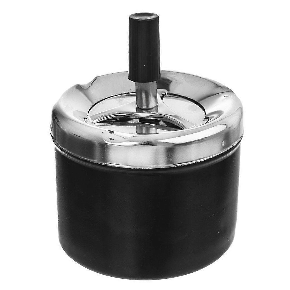 Ashtray with lid that hides cigarette residue and odors