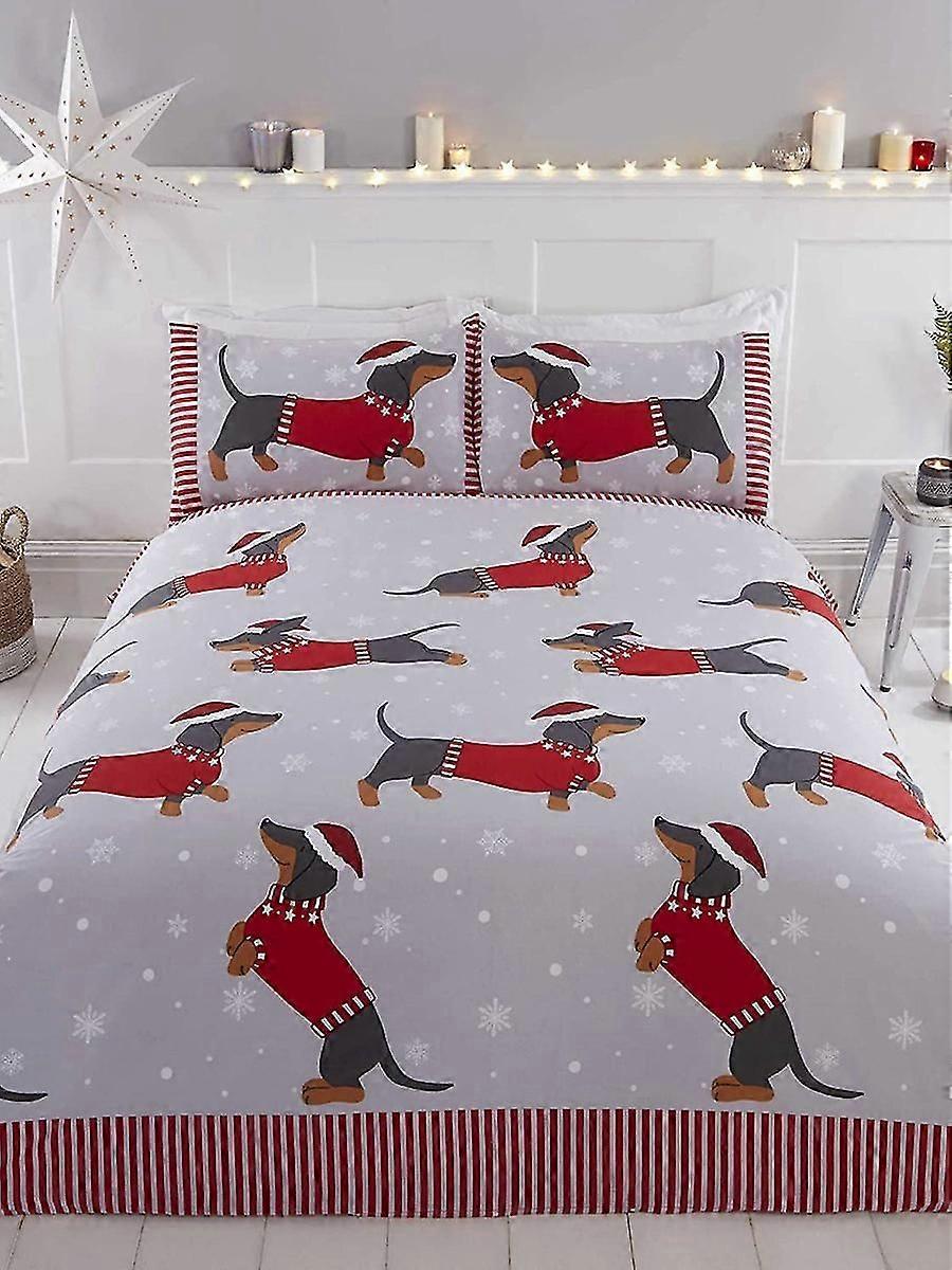 Teckel à travers la neige Ensemble de housse de couette de Noël unique