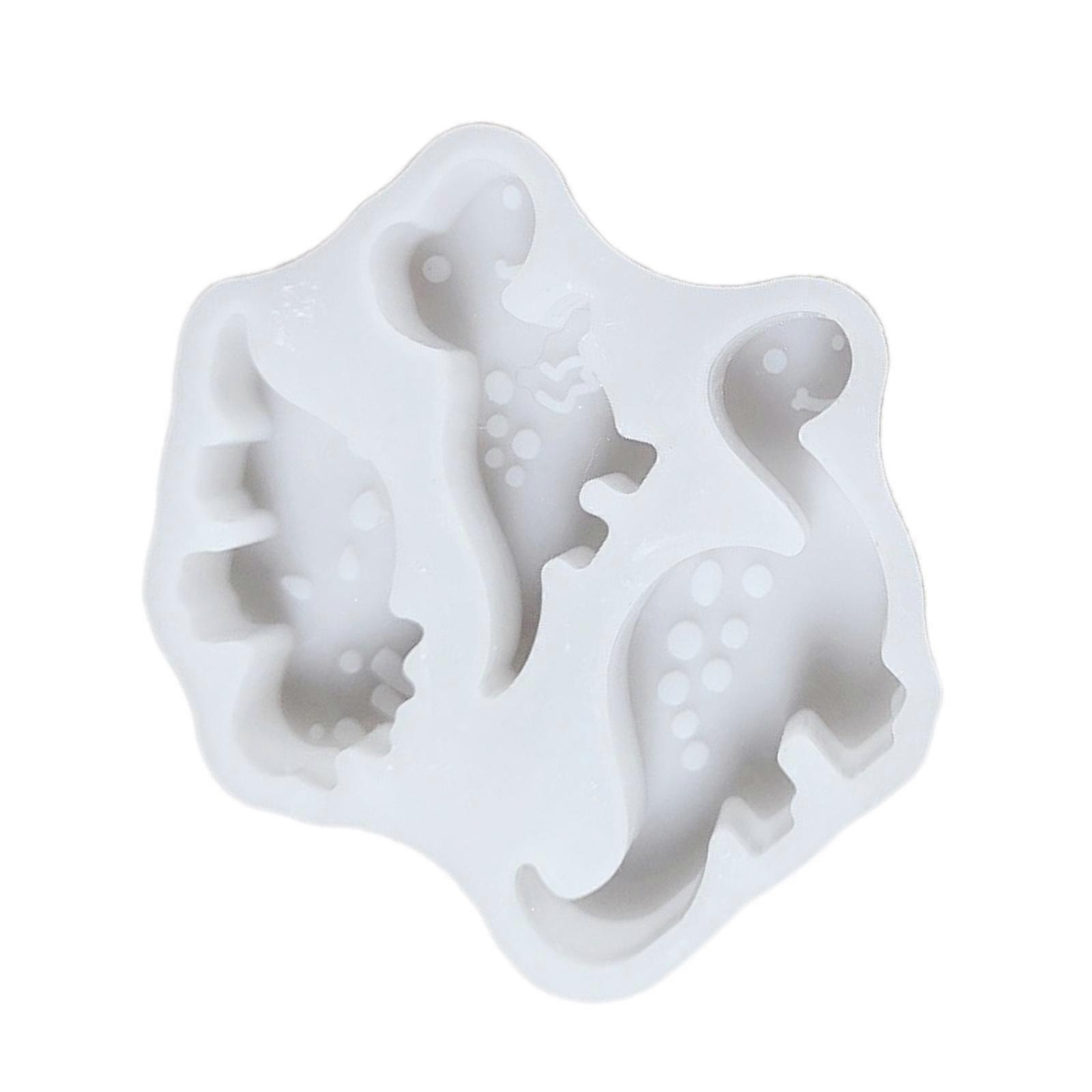 אוסף תבניות סיליקון בנושא דינוזאור להכנת נרות מלט יצירתיים וצבעוניים