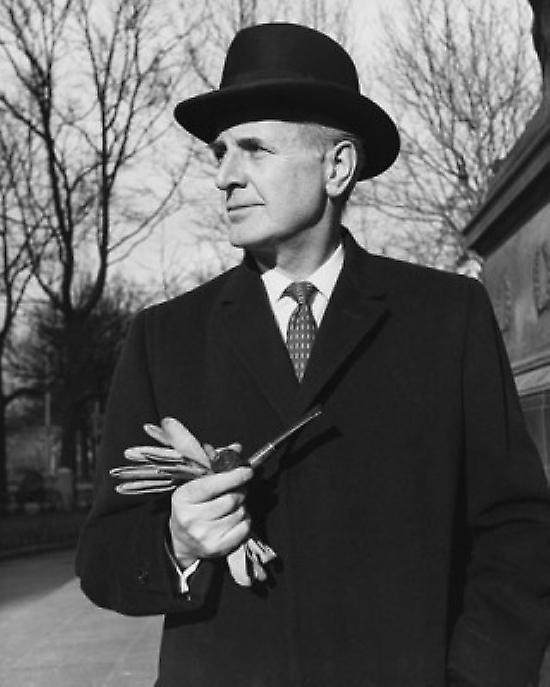 Businessman holding a pipe Poster