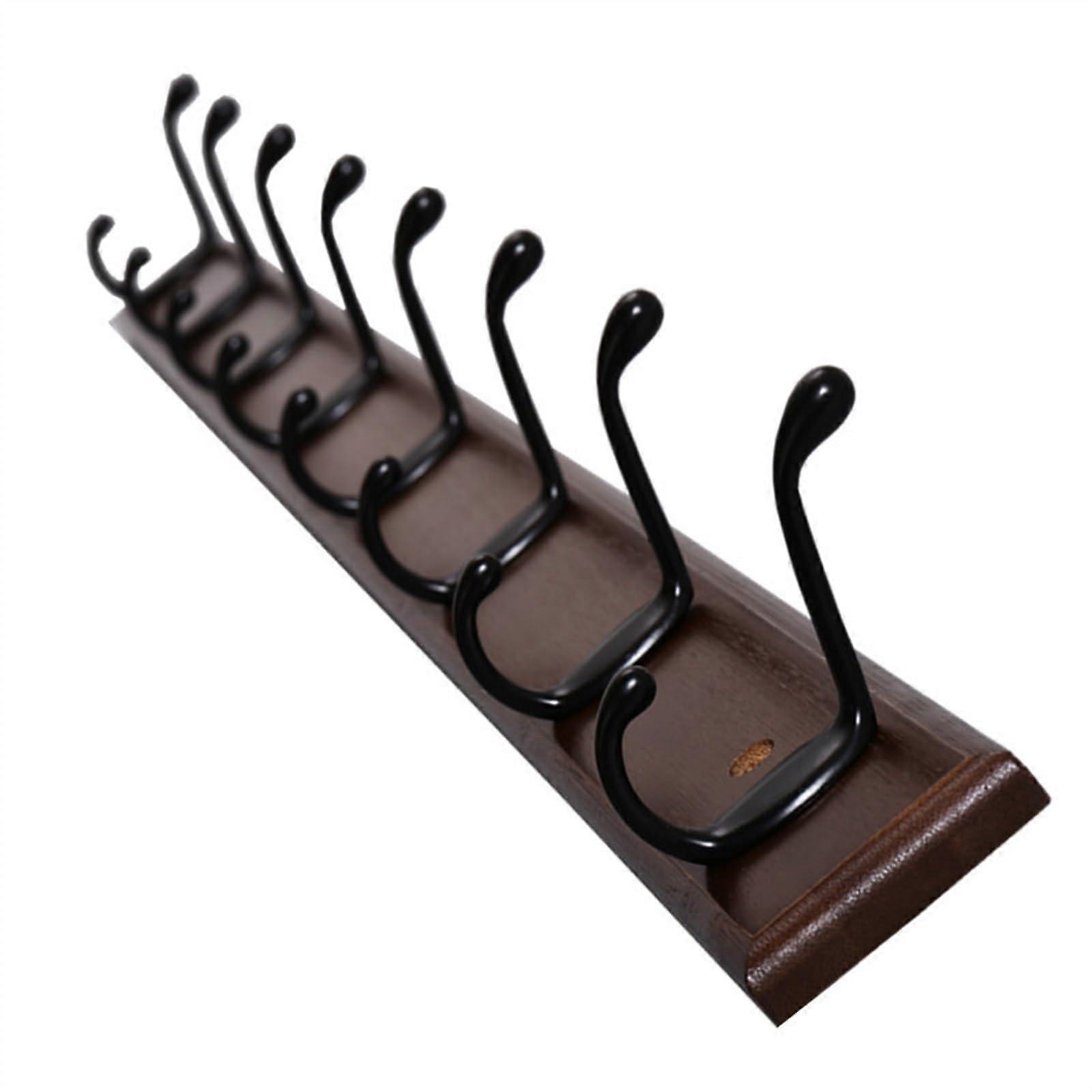 Wallmounted coat racks, wallmounted coat rack holder with 8 black hooks for hanging towels, clothing, hats, and ironing boards.