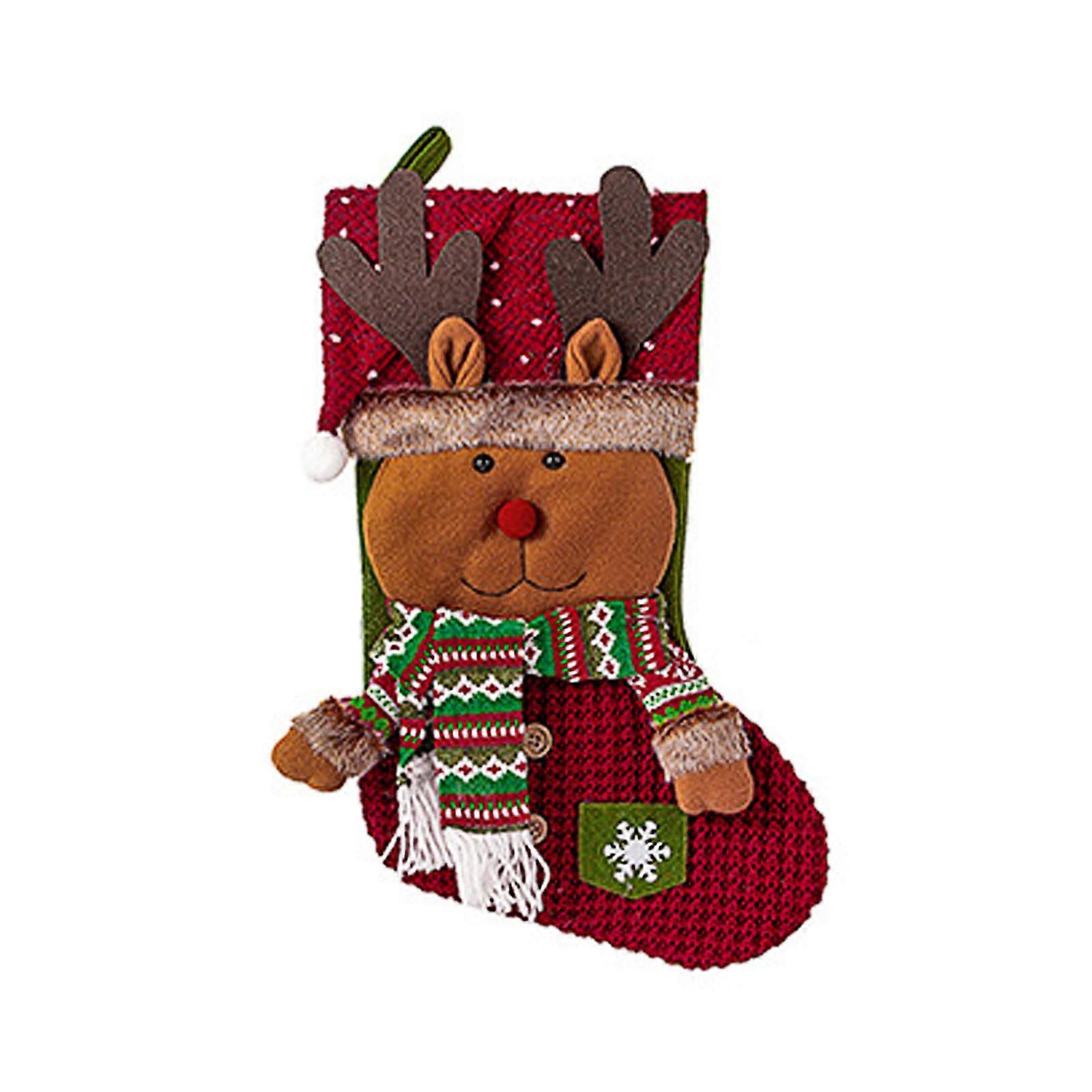 Jultomten snögubbe älg gåva strumpor