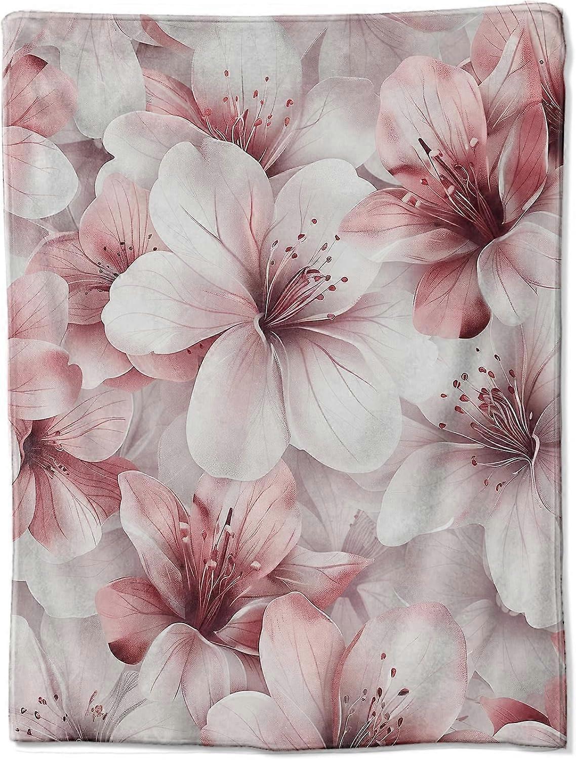Wrap Yourself in This Luxurious Flannel Blanket Featuring a Delicate Pattern of Soft Pink and White Blossoms, Perfect for Adding a Touch of Elegance a