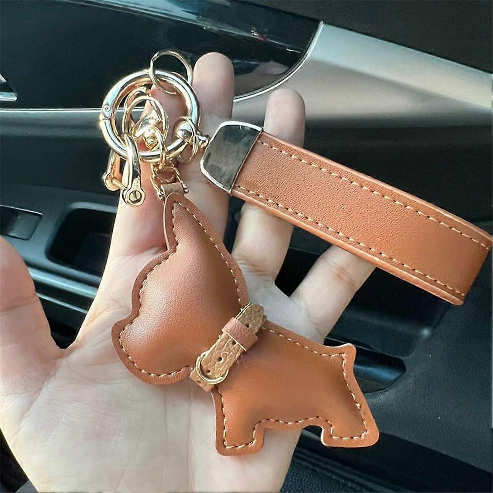 Leather Dog Keychain for Car Keys and Bags with Cute Puppy Cartoon Design in Brown