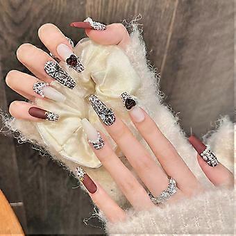 Elegante juego de uñas postizas con mariposas de perlas